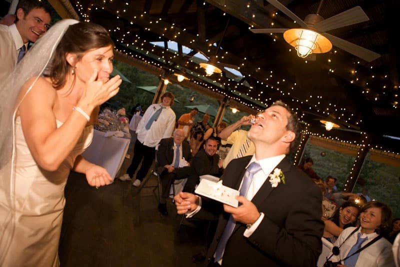 groom eating cake