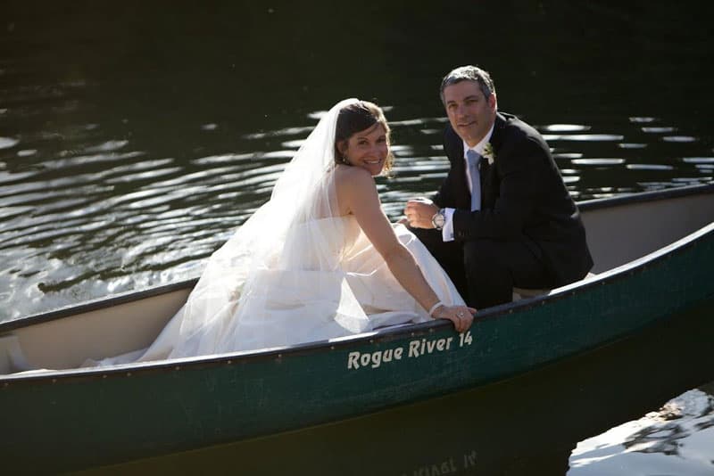 bride and groom in a canoe