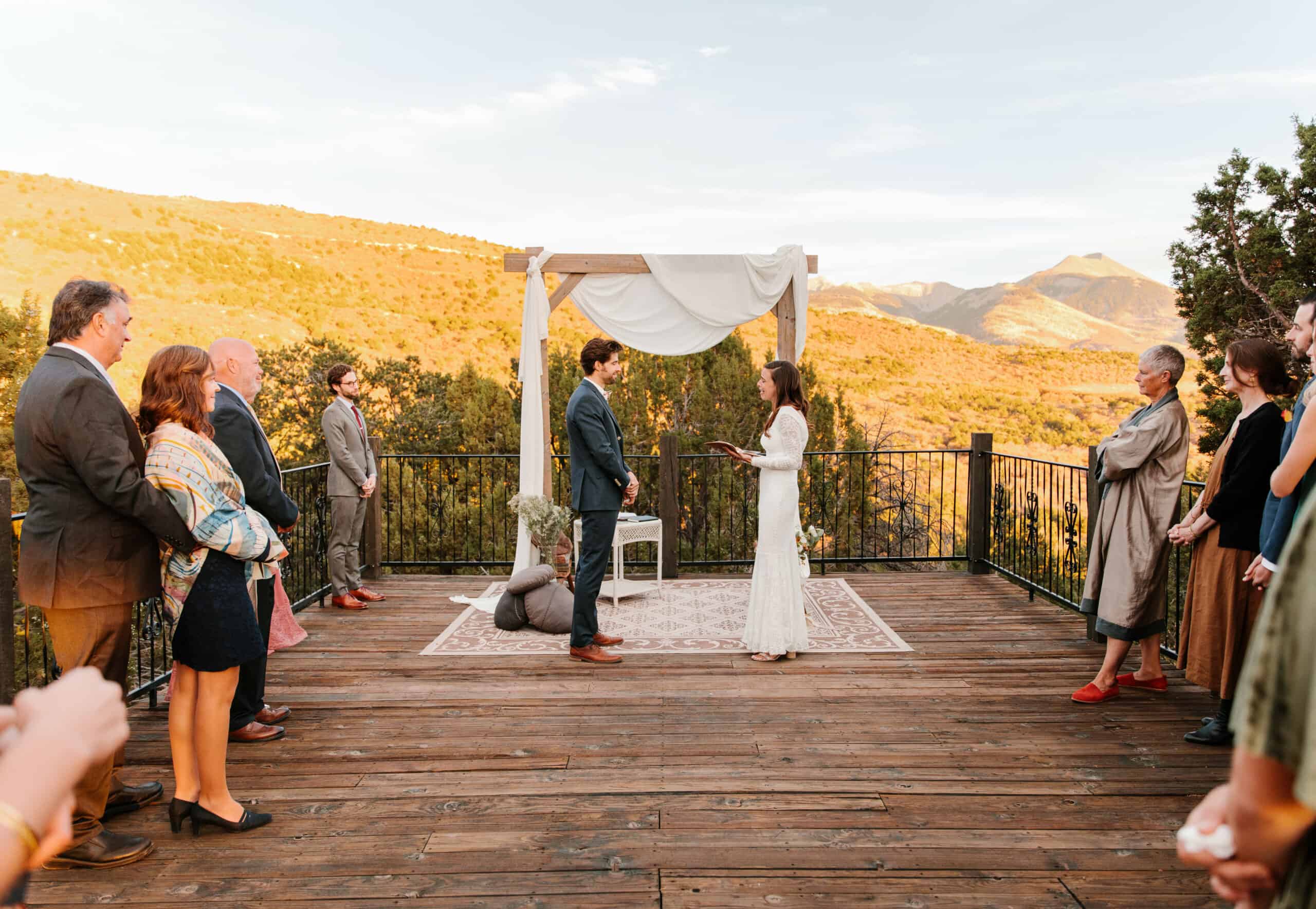 couple exchanging vows at alter